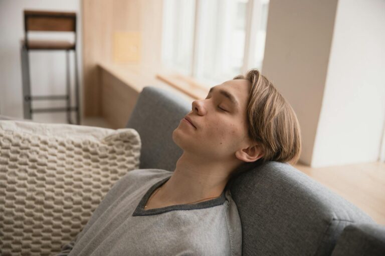 Photo Of Man Sleeping On Sofa