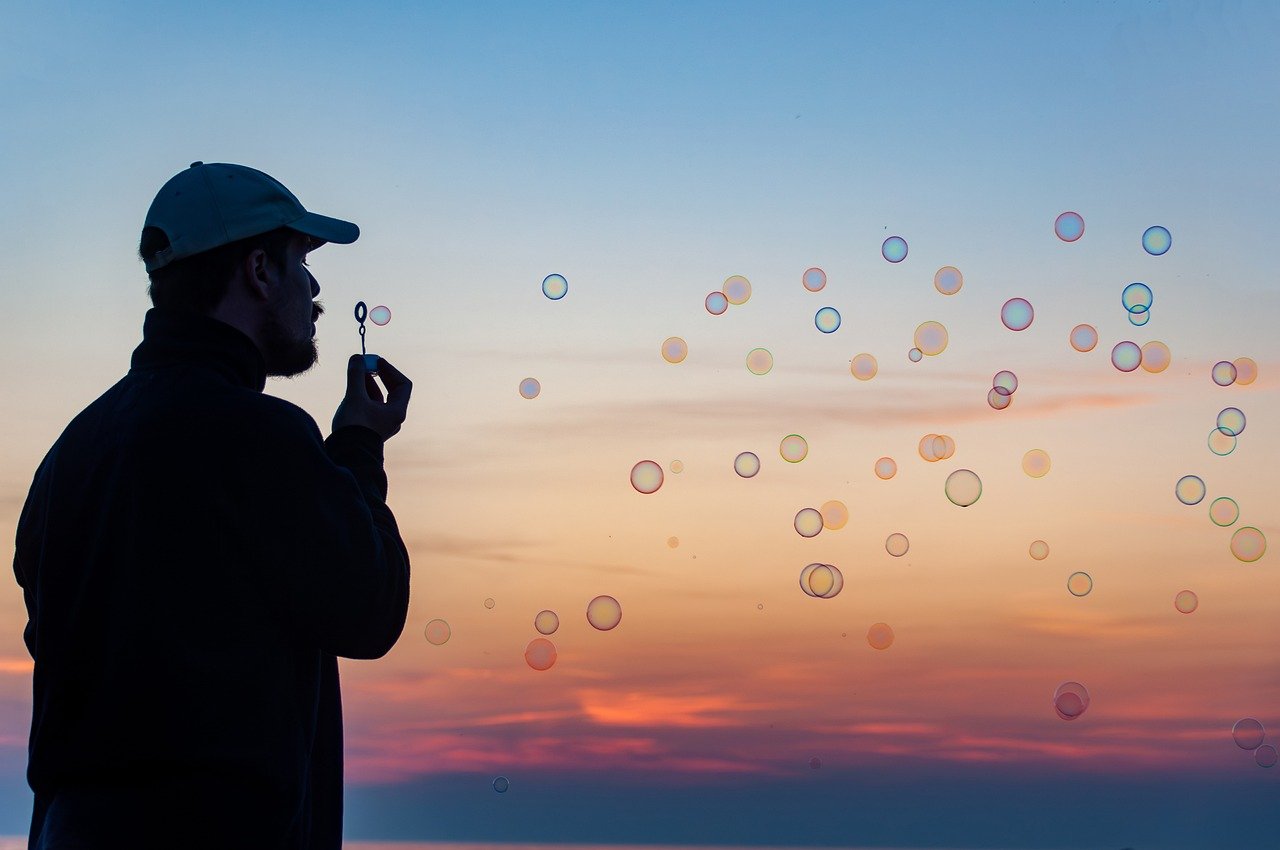 soap bubbles, blowing bubbles, sunset