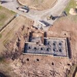 foundation, aerial view of brown and gray concrete building